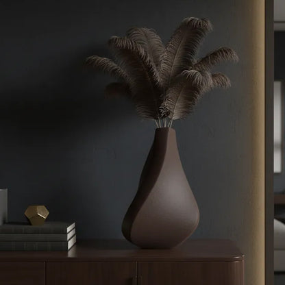 3D-printed sculpture of a contemplative vase,black
