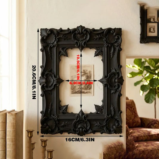 A gorgeous 3D-printed wall-mounted picture frame, perfect for displaying antique prints. Black.