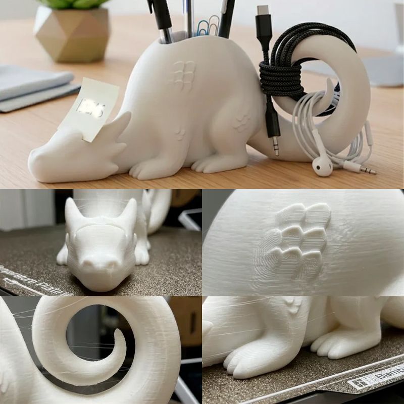 A 3D-printed dragon-shaped desktop organizer adds a touch of fantasy and order to your workspace. (White)