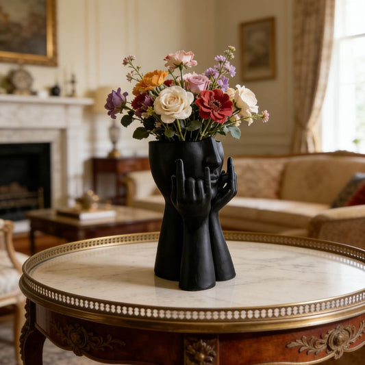 3D-printed rock face vase or office organizer, black.