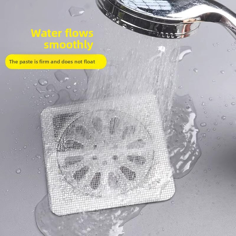 Attach a bathroom hair filter to the floor drain